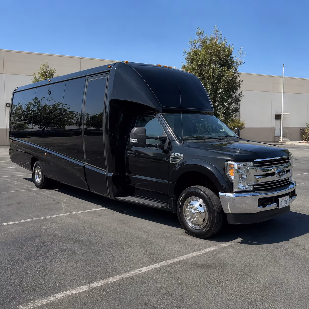 Group beside a Mercedes Sprinter limo in Boulder